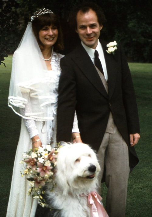 Iain and Liz, on their wedding day with Dylan the Old English sSheepdog.